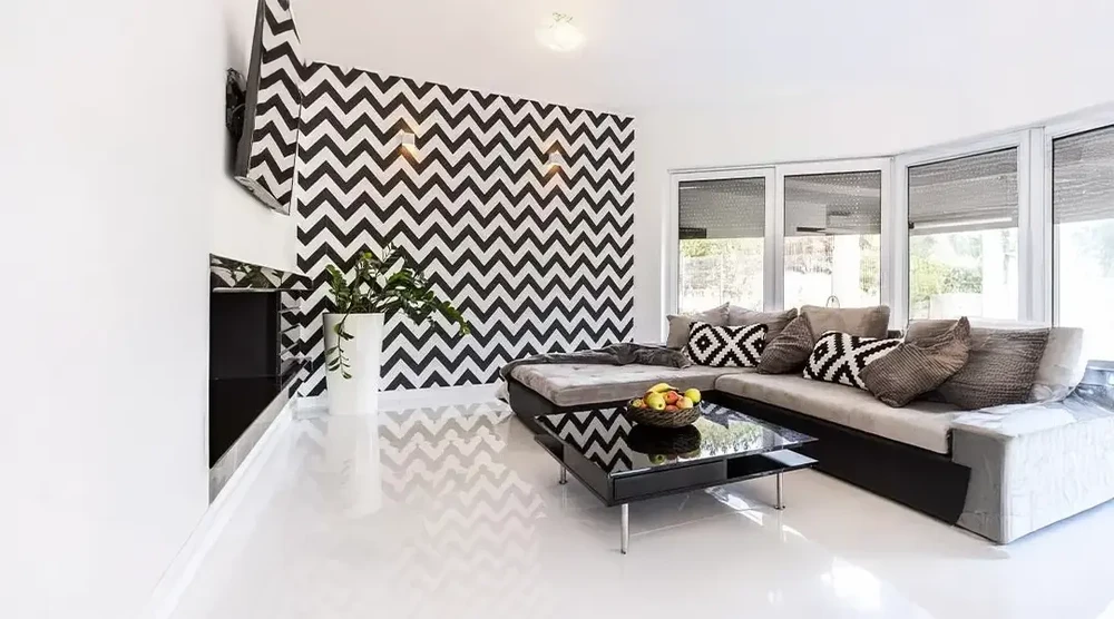 Terrasse extérieure moderne avec dallage en grès cérame grand format beige clair, joints fins